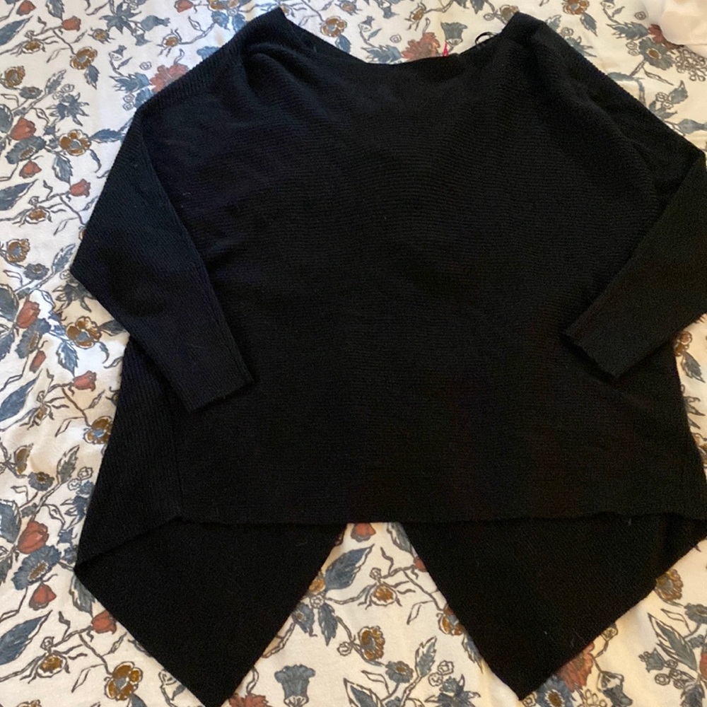 Black ribbed sweater twist design on back
